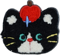 Flurry Black Cat with Apple on Head