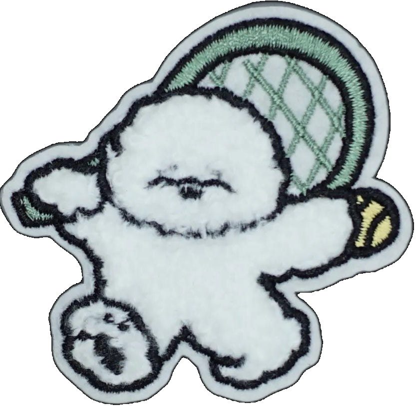 Fluffy White Dog Playing Tennis