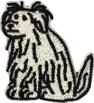 Black and white sitting shaggy dog embroidered patch