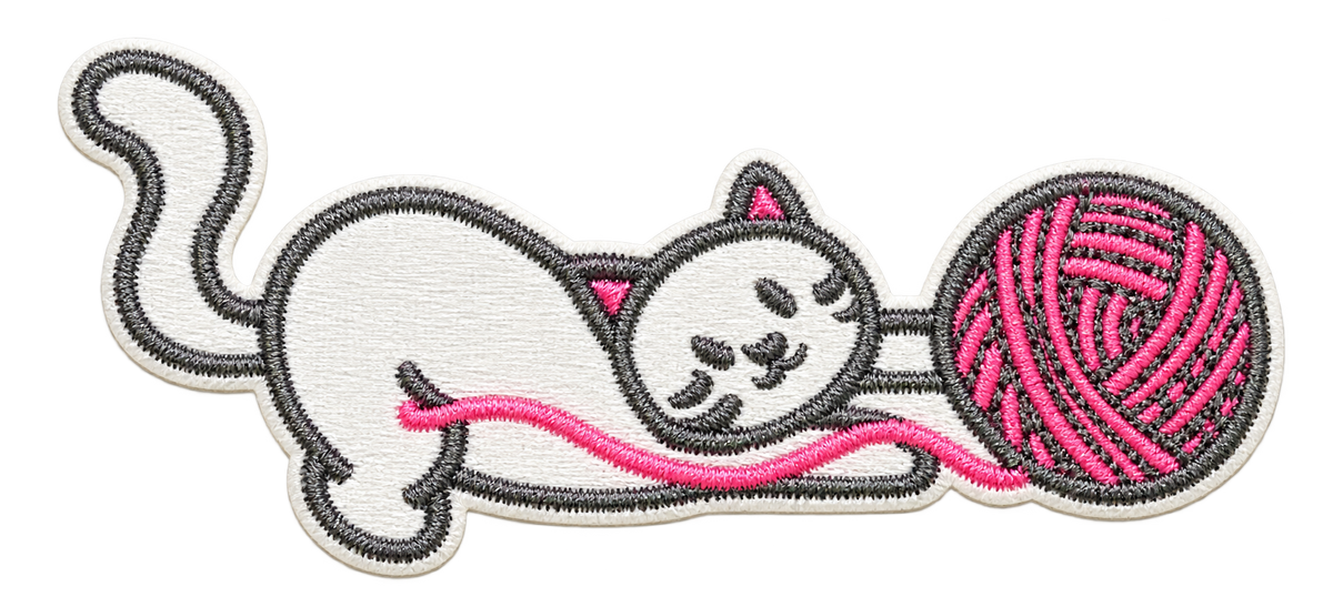 White cat playing with pink yarn embroidered patch